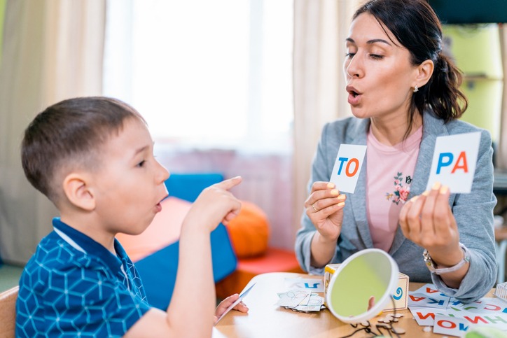 Young child indulging in home health speech therapy in Houston house