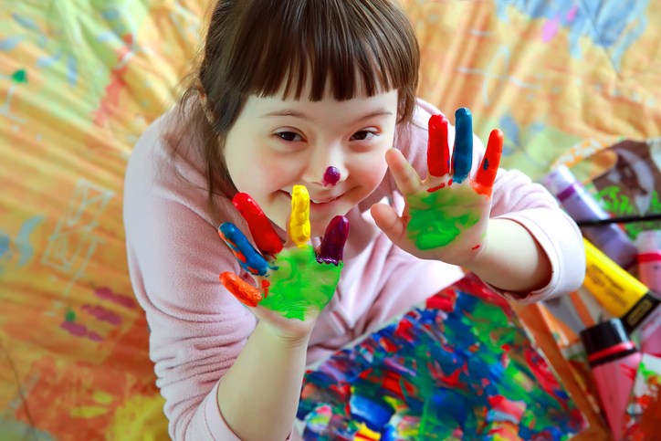 Child with Down syndrome getting expert care at Daisy Kids Care in Houston, TX